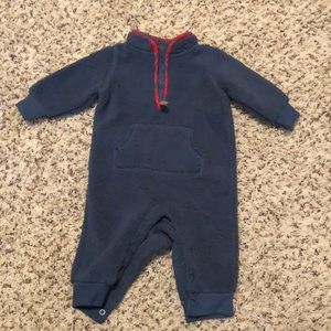 Baby boy fleece onesie with plaid neck.